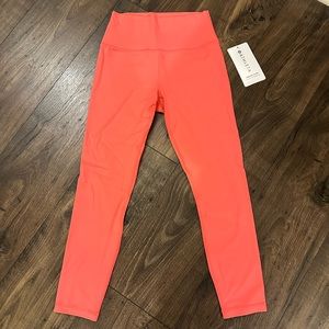 Athleta Pink Transcend 7/8 Tights